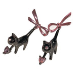 kitten bow earrings boogzel clothing