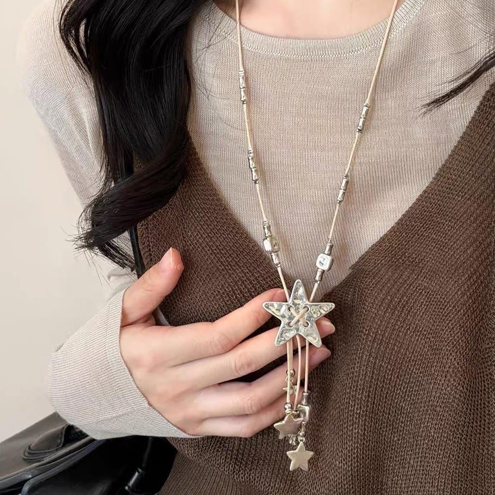 long star charm necklace boogzel clothing