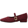 This aesthetic Mary Jane shoe featuring a square toe, low block heel, and soft suede-like surface. Designed with a slim strap and shiny gold buckle