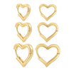 golden heart-shaped earrings boogzel clothing