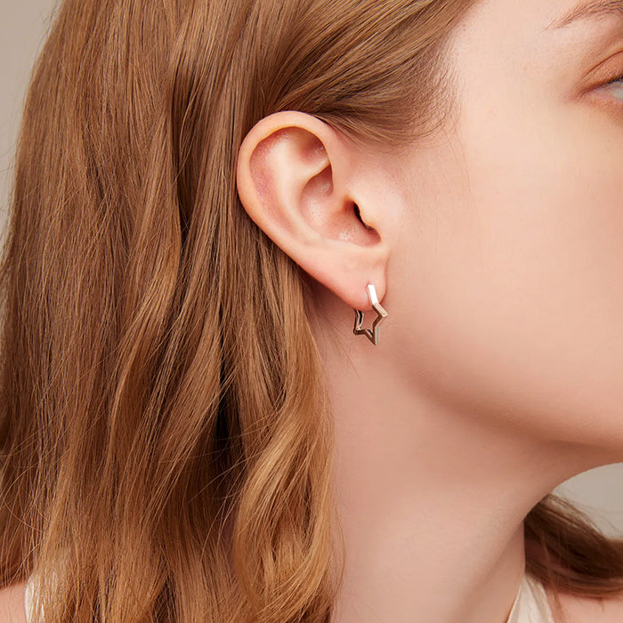 minimalist star earrings boogzel clothing