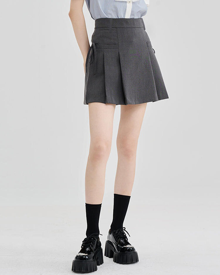 pleated mini skirt with bows on side boogzel clothing
