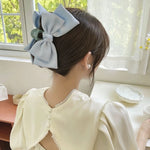 blue bow hair claw boogzel clothing