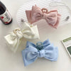 pastel pink bow hair claw boogzel clothing