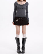 black pleated skirt with buckle belt boogzel clothing