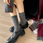 red and grey patterned socks boogzel clothing