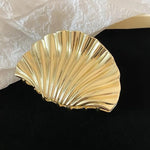 shell gold hair claw boogzel clothing